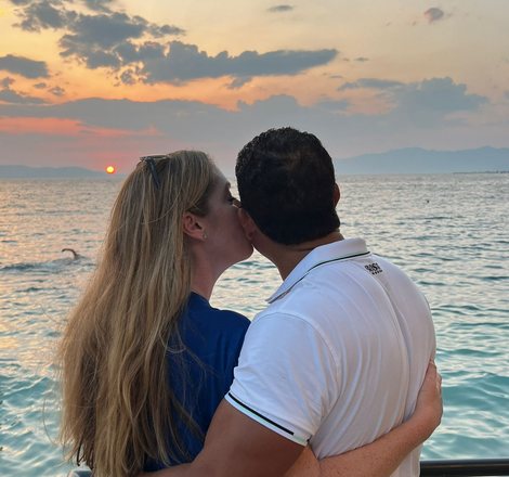 Janine and Omar sunset kiss